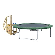 Trampoline with slide, climbing wall and staircase